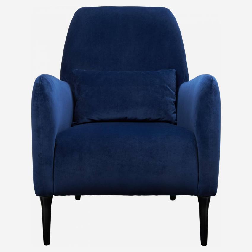 Blue velvet armchair with dark legs