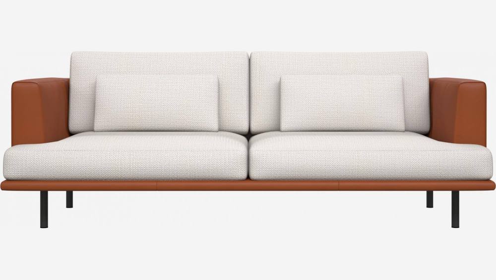 3 seater sofa in Fasoli fabric, snow white with base and armrests in brown leather