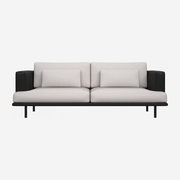 3 seater sofa in Fasoli fabric, snow white with base and armrests in black leather