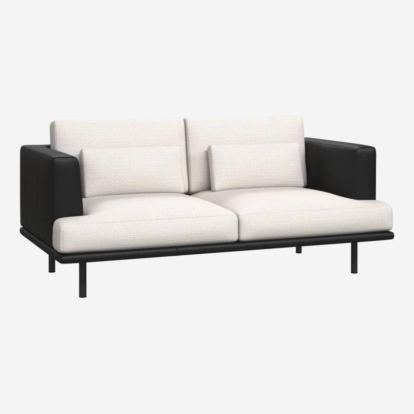 2 seater sofa in Fasoli fabric, snow white with base and armrests in black leather