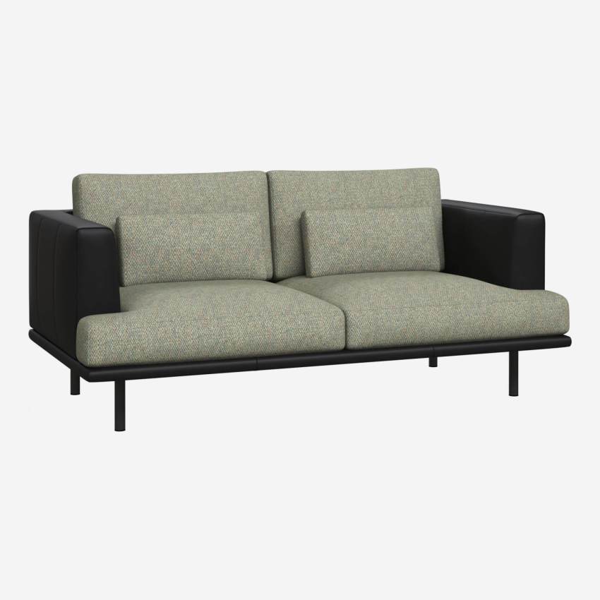 2 seater sofa in Bellagio fabric, organic green with base and armrests in black leather