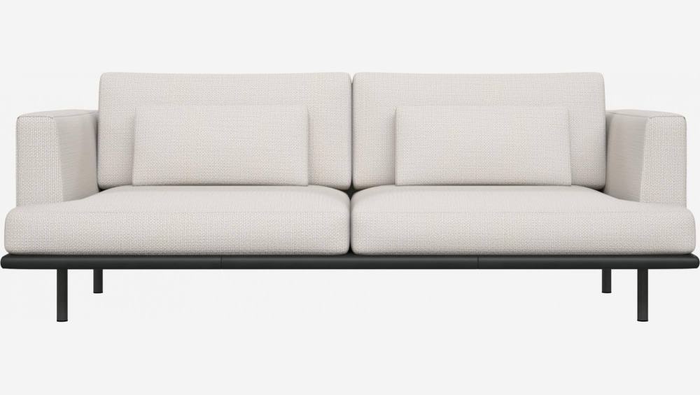 3-seater sofa in Fasoli snow white fabric with black leather base