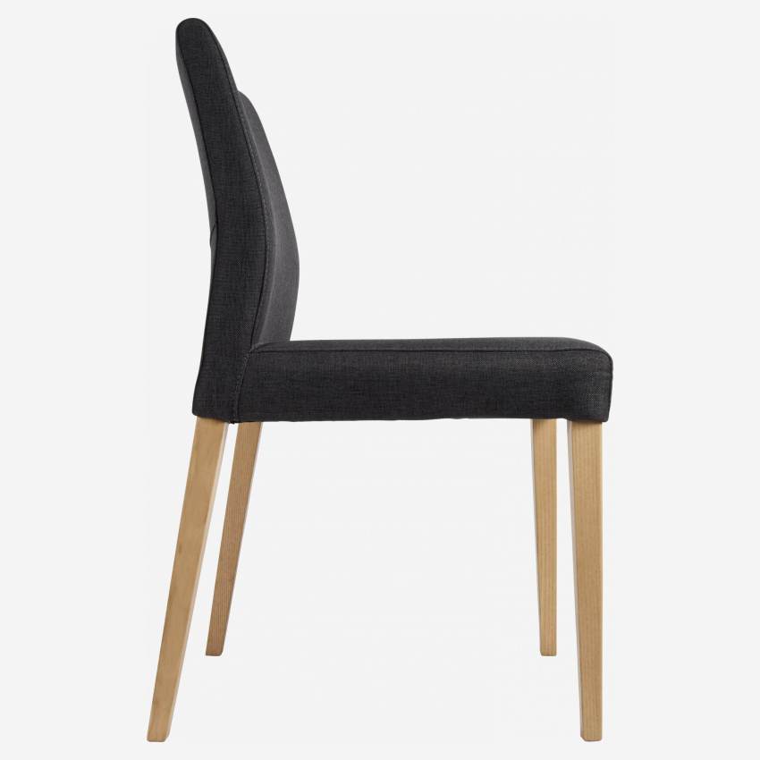 Dark grey fabric chair with ash legs