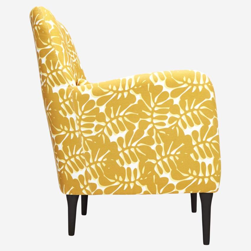 Yellow patterned armchair 