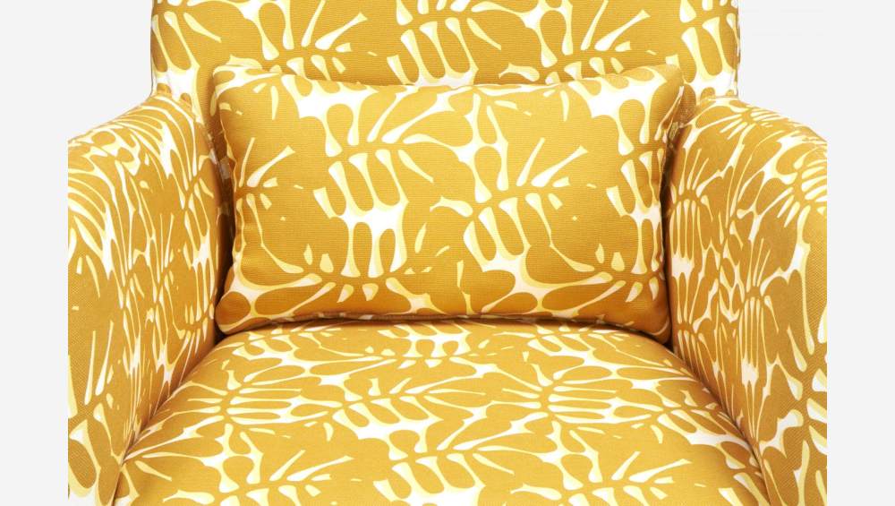Yellow patterned armchair 