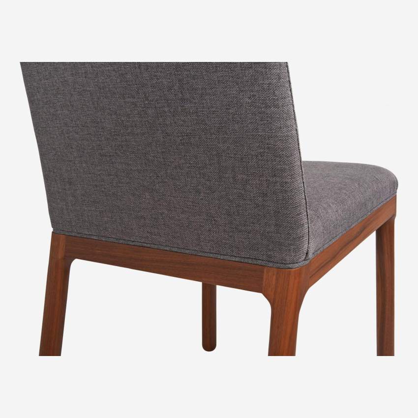 Grey fabric chair with walnut legs