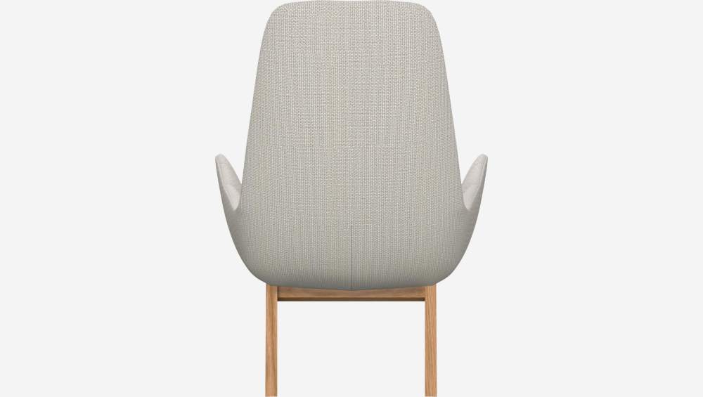Armchair in Fasoli fabric, snow white with oak legs