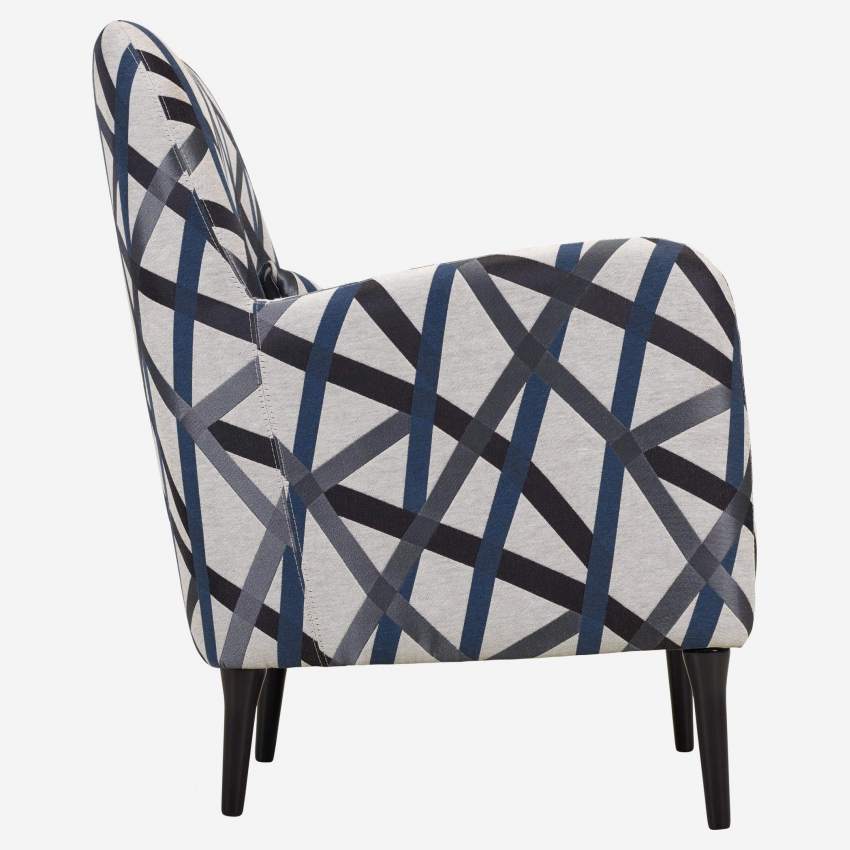 Sessel mit blauem Motiv, dunkle Füße - Design by James Patterson