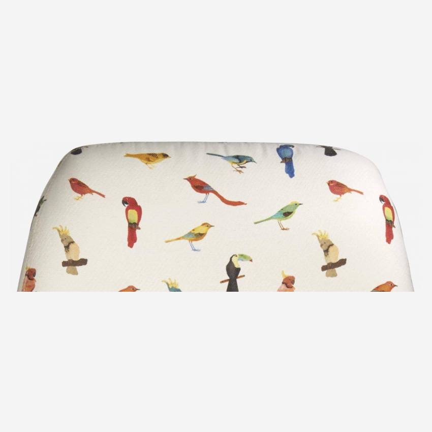 Bird motif fabric armchair with oak legs