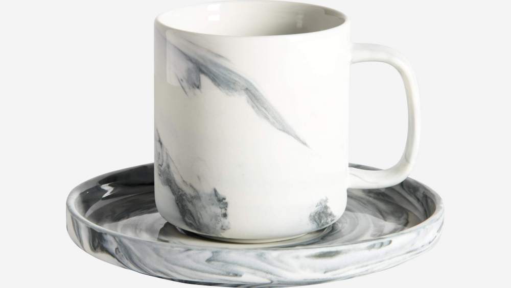 Taza de café con plato de porcelana gris efecto mármol